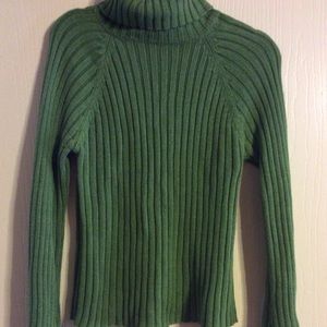 Pretty green turtleneck sweater with bell sleeves.
